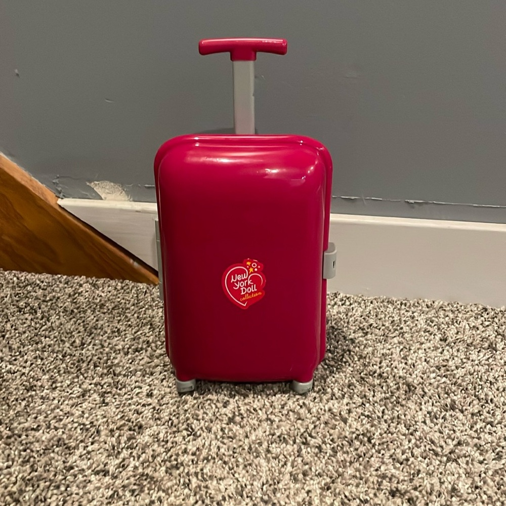 Our generation doll travel set. Pink and comes with many accessories.
